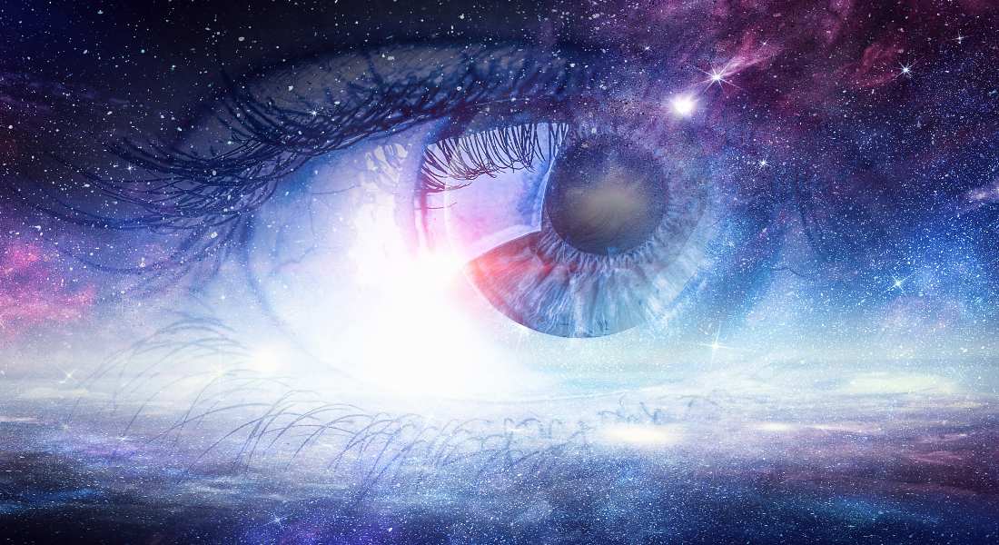 Artistic depiction of an eye with a cosmic background.