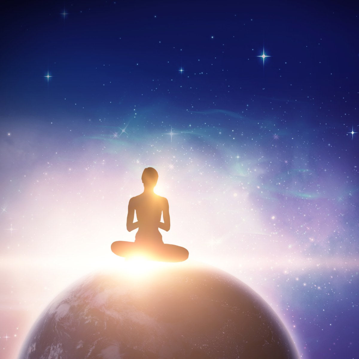 Silhouette of a meditating person on planet Earth with a starry night sky background.