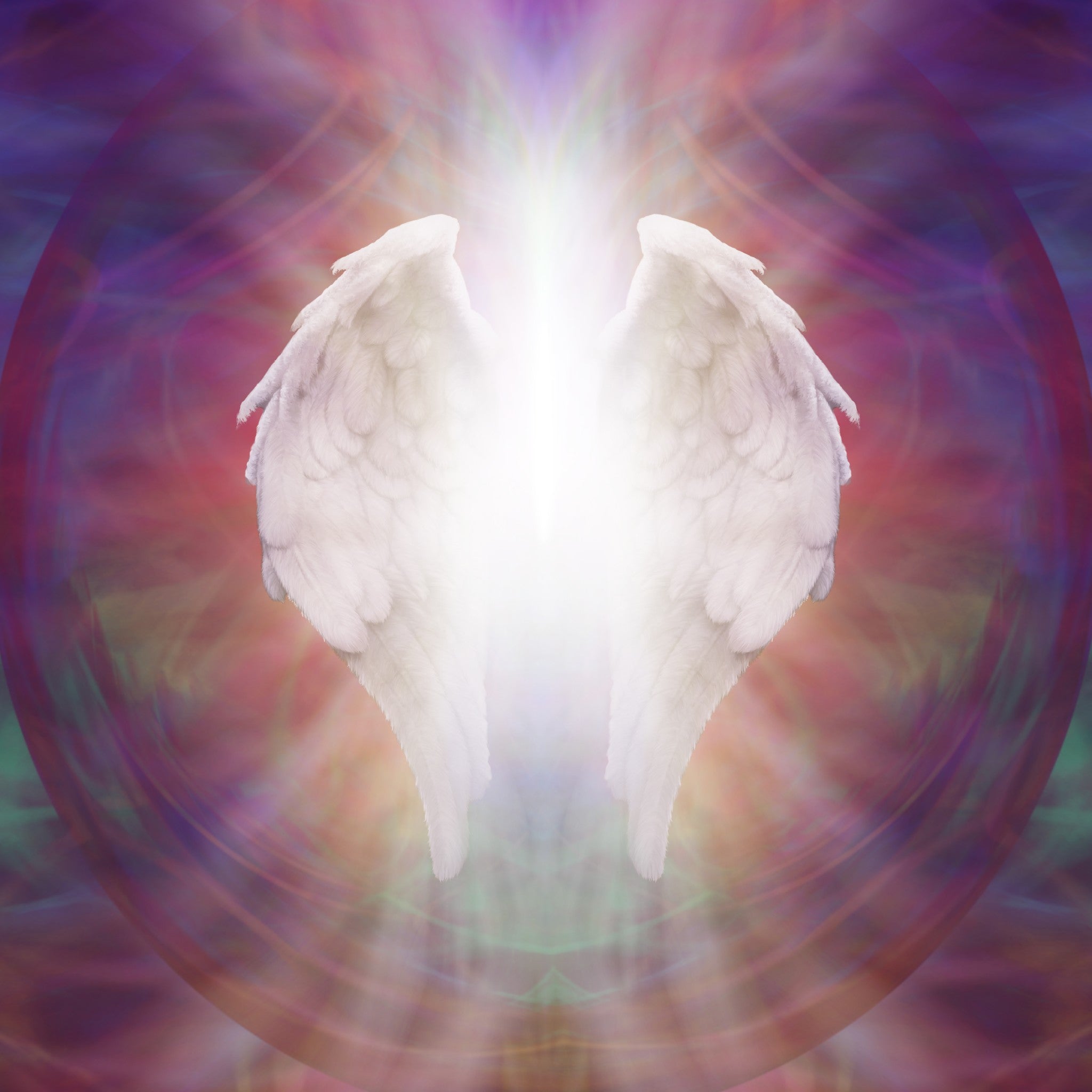 White angelic wings glowing against a colourful background, suggesting Archangel Zadkiel.