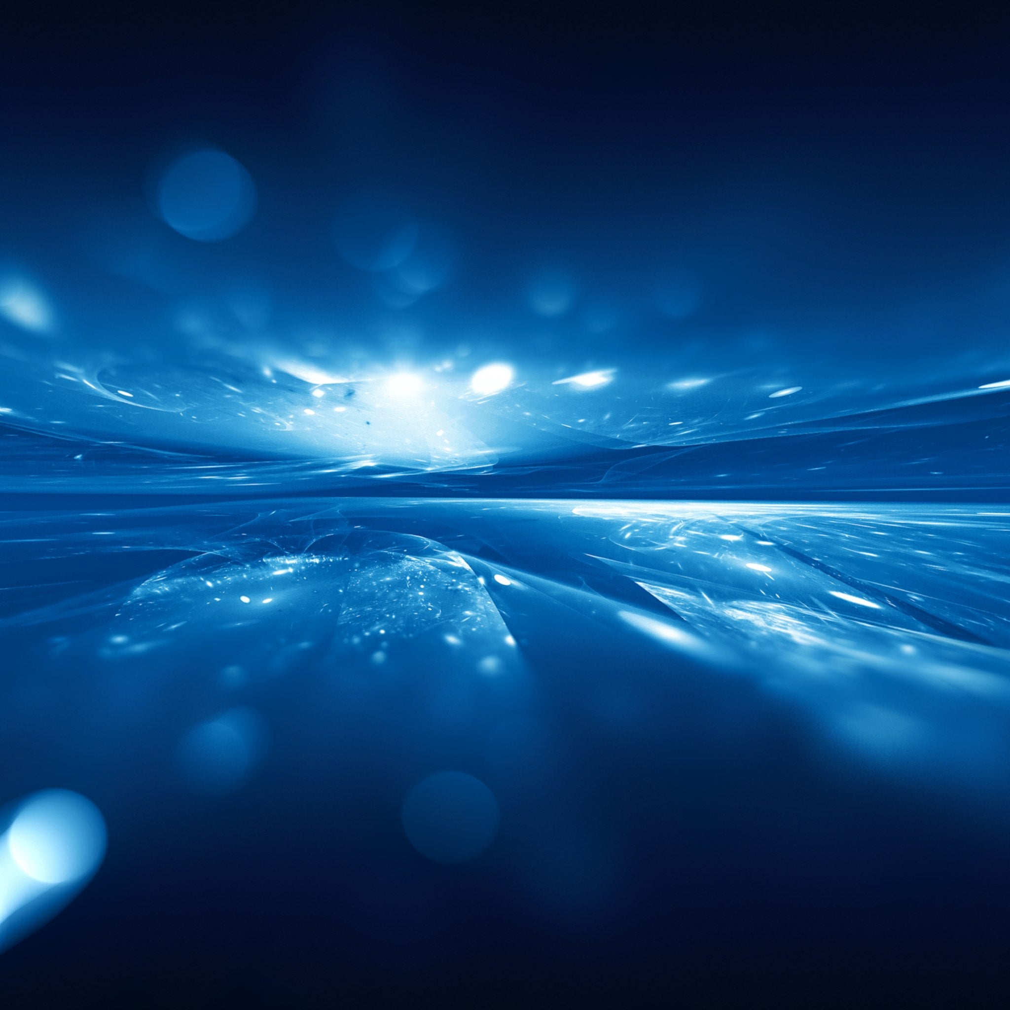 An abstract, deep blue horizontal landscape of glowing, rippling waves of light and sparkling bokeh, suggesting an ethereal, futuristic, or celestial plain.