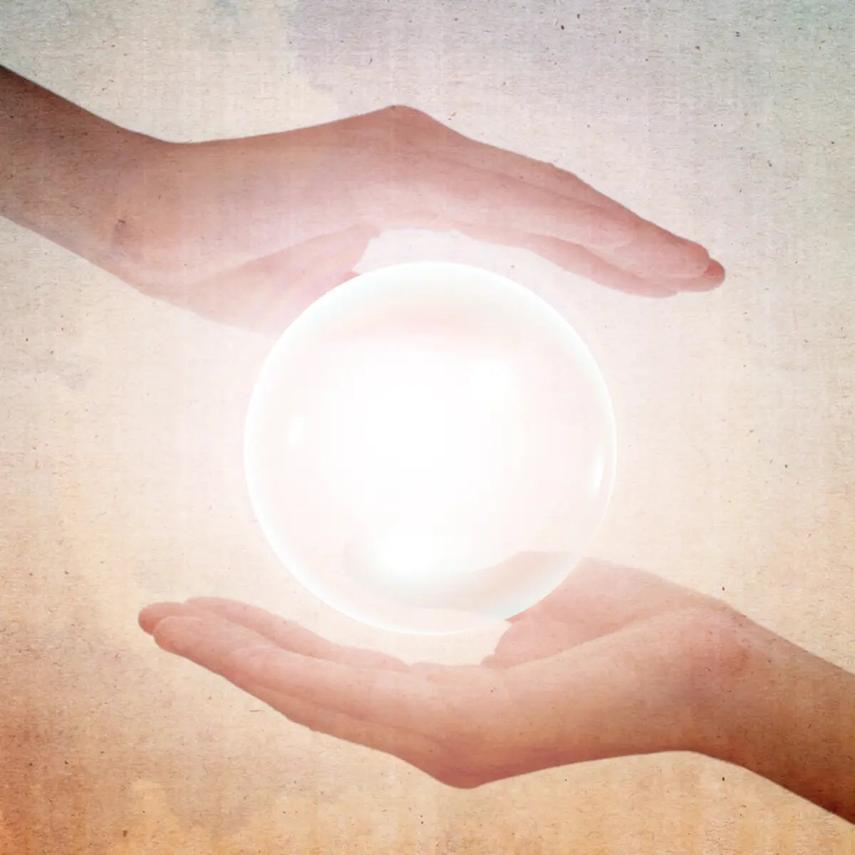 Attunement illustration: hands holding glowing energy sphere.