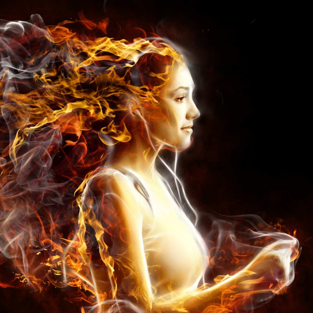 Woman with fiery hair against a dark background symbolising energetic clearing.