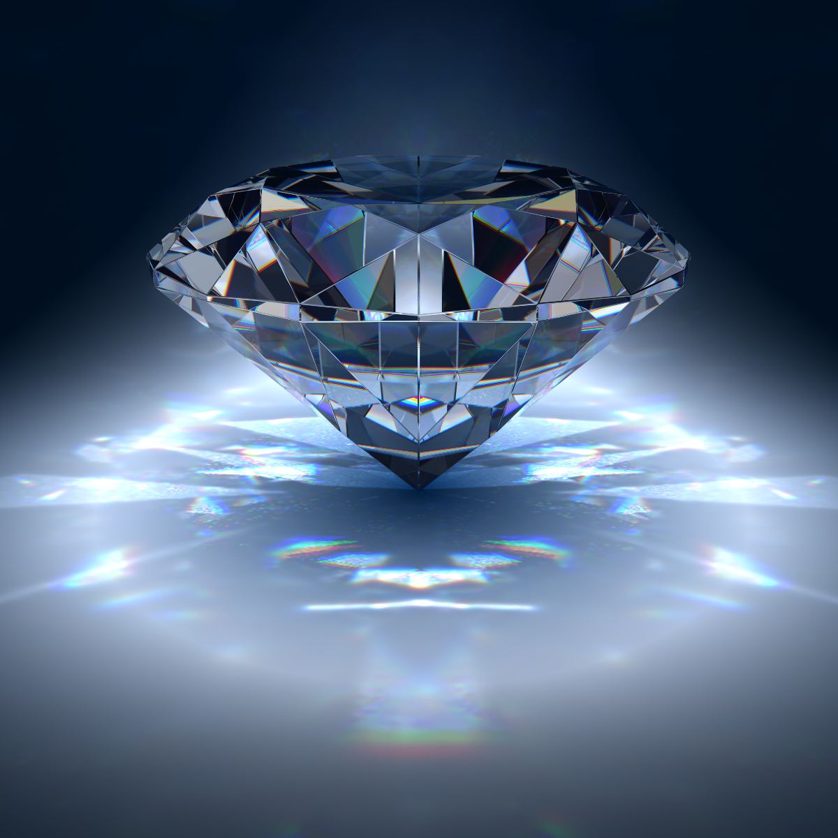 A large, brilliantly cut diamond floating against a dark background, reflecting bright light and creating vibrant rainbow-coloured prismatic flares on the surface below.