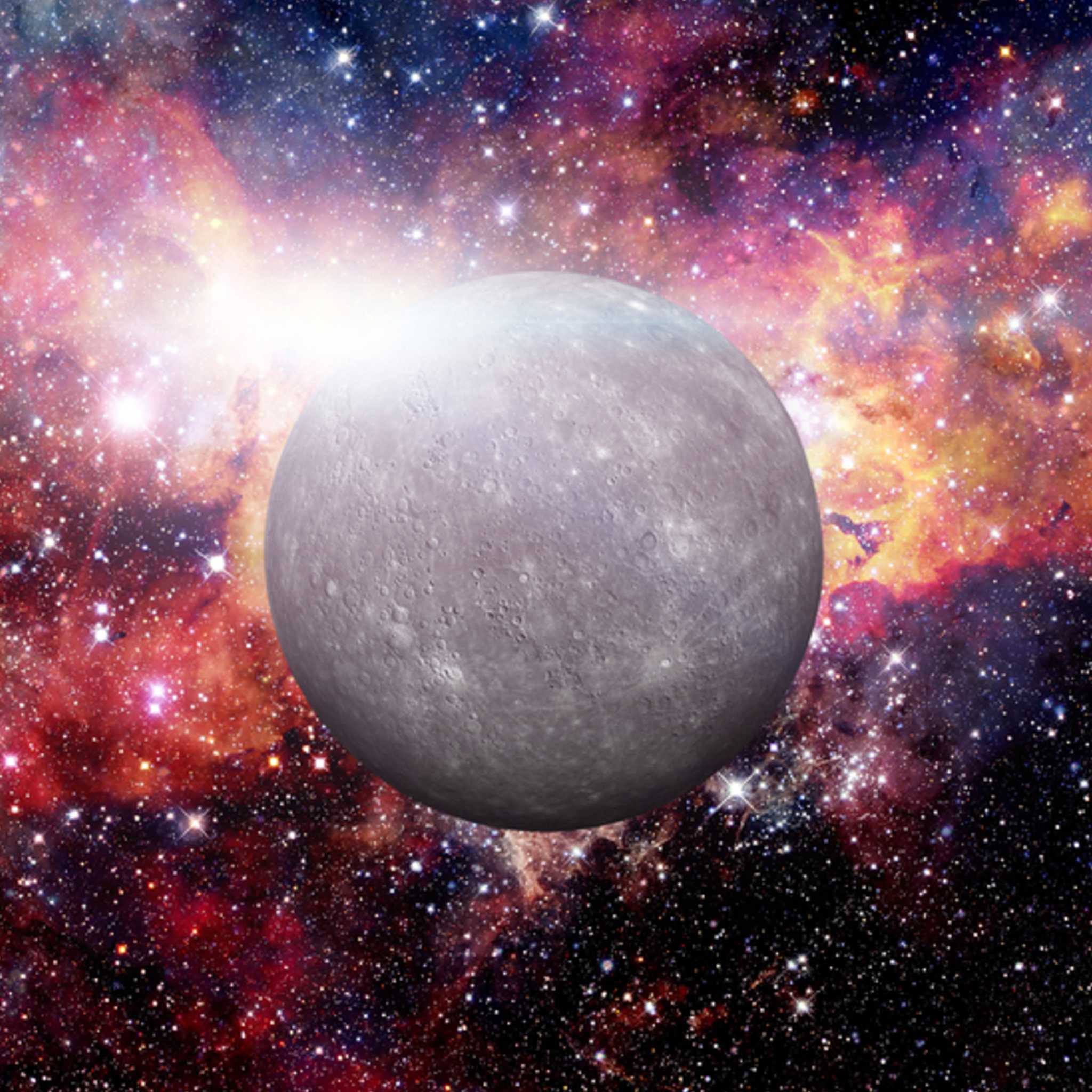 Planet Mercury against a colourful nebula background.