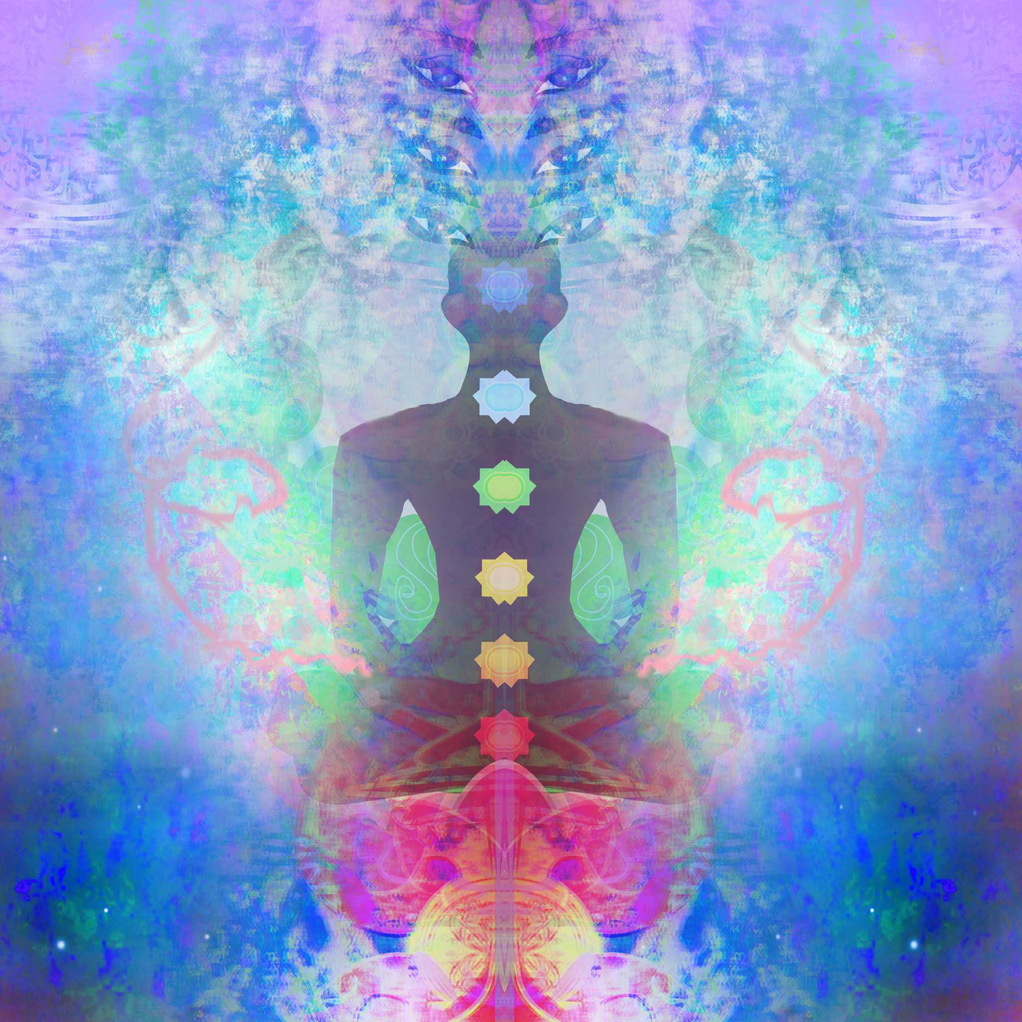 A highly colourful, abstract digital illustration featuring a seated meditating silhouette, overlaid with the seven energy centres of the body, or chakras, represented by glowing, coloured symbols. The background is a vibrant, swirling mix of blue, pink, and purple light, symbolising the intense energy of the kundalini awakening.