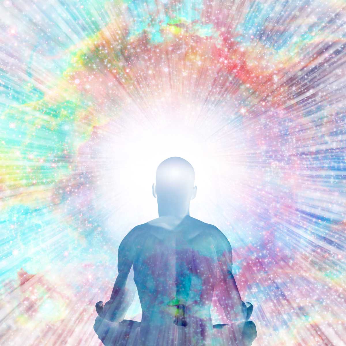 Silhouette of an enlightened person meditating against a colourful, radiant background.