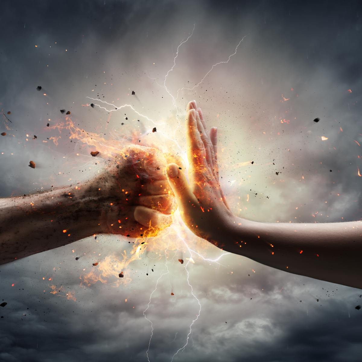 A human fist and an open palm meet with a bright light and energy effect.