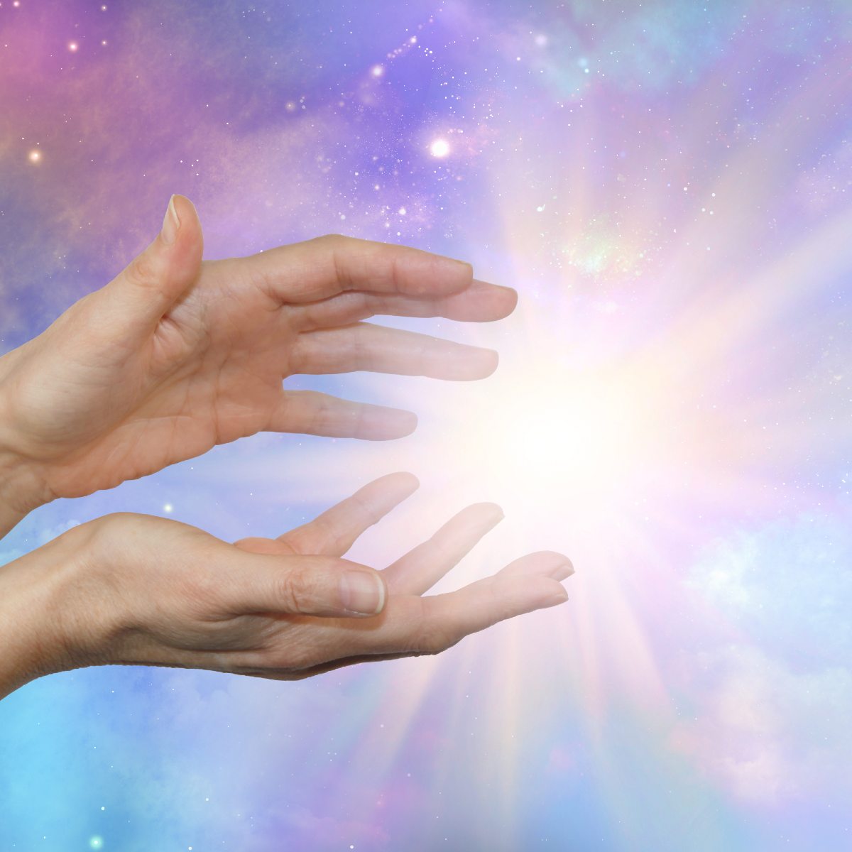 Two hands reaching towards a bright light source with a pastel, starry background