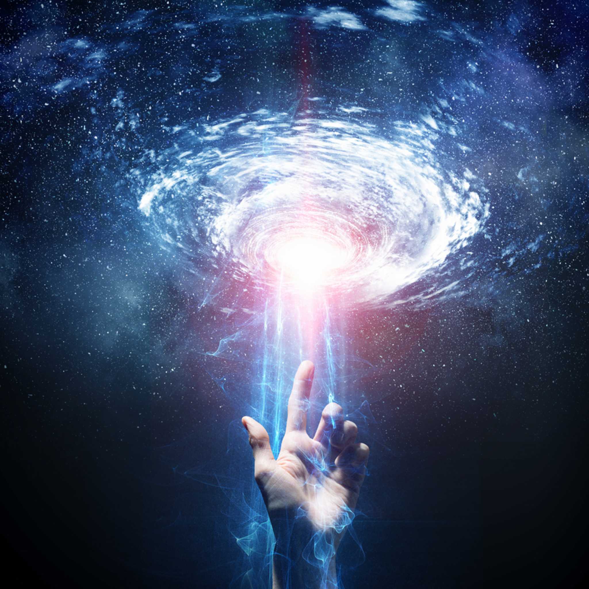 A hand reaching up to a powerful light beam descending from a blue, swirling cosmic galaxy or vortex.