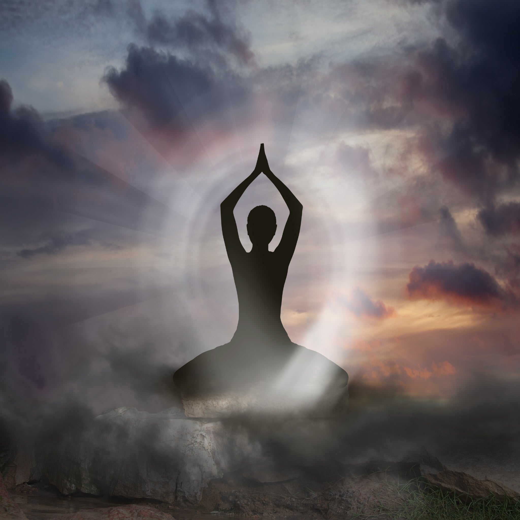 Silhouette of a person in a yoga pose against a dramatic sky with clouds and sun surrounded by protective white light.