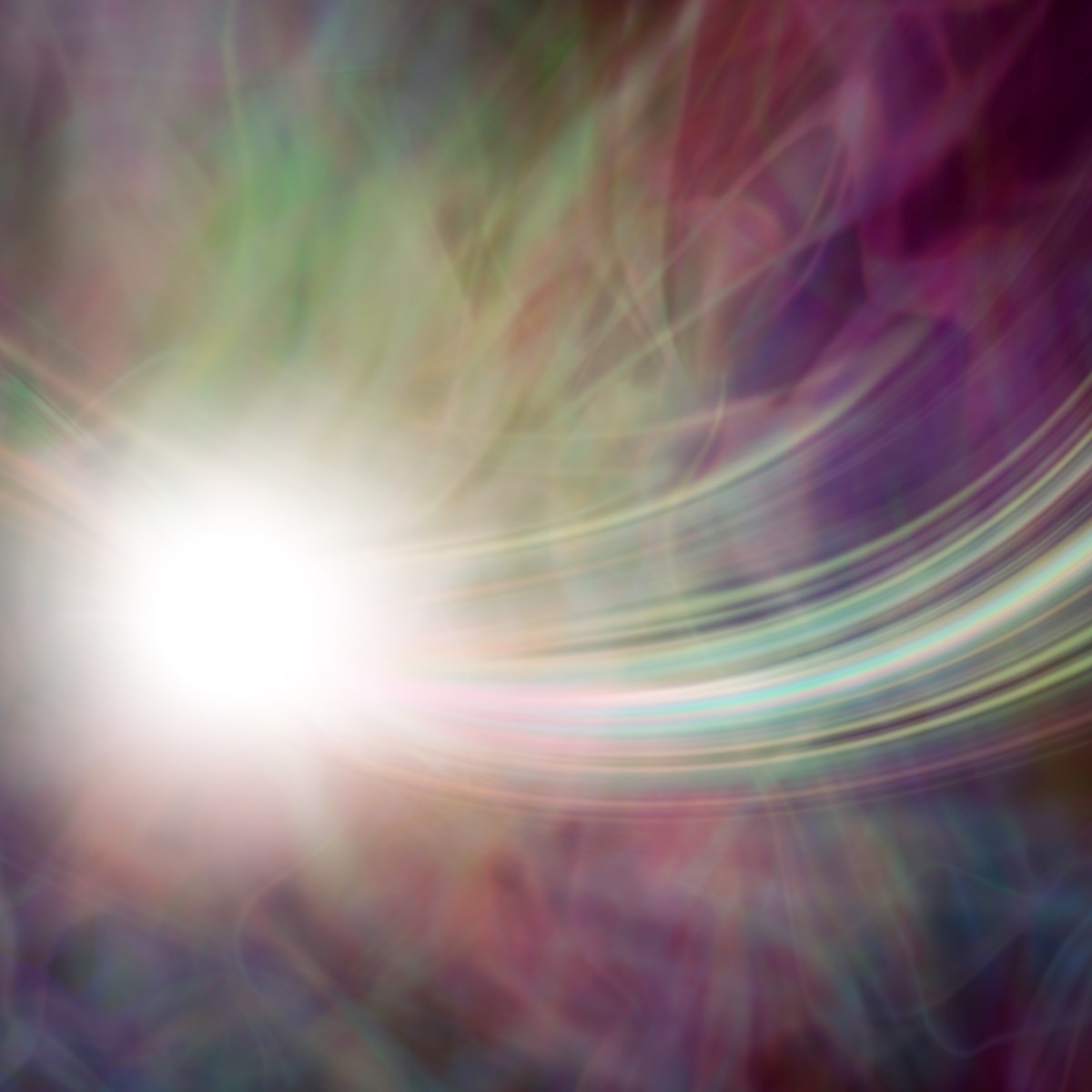 Abstract multicoloured circular Reiki light pattern.