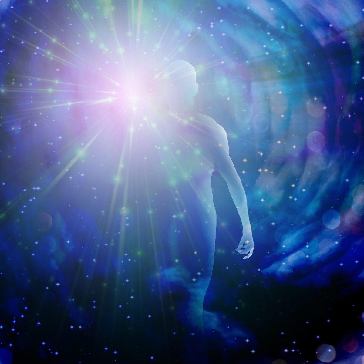 Silhouette of a person with a bright light source in a dimensional starry background.