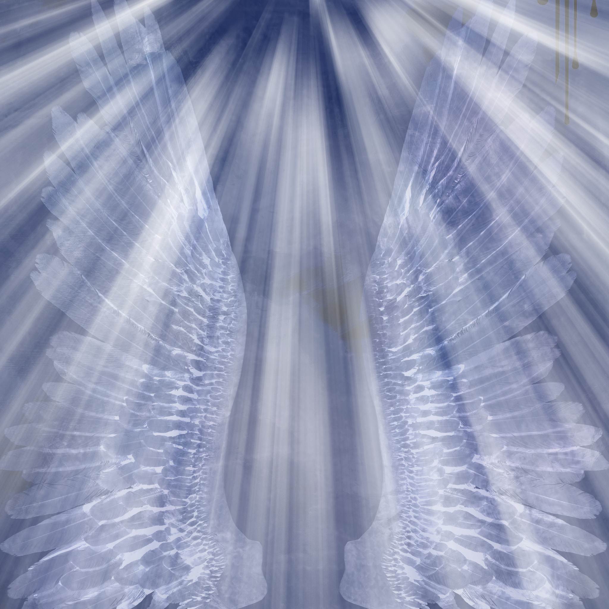 A digitally generated celestial background dominated by brilliant white light rays radiating downwards against a soft, textured blue sky. Two large, translucent, white angel wings frame the vertical rays of light.