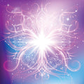 Mandala design with swirls of high vibration energy on a gradient background.