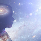 A silhouette of a person's profile against a cosmic background with stars and a galaxy.