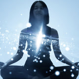 A silhouette of a young woman sitting in a meditative pose, with her heart centre illuminated by an intense burst of white light and sparkling, ethereal particles against a bright, light-blue background.