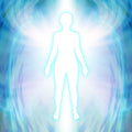 A white, glowing silhouette of a human figure, symbolising an angel or spirit, standing against a backdrop of swirling light blue and white energy, resembling large, vibrant wings.