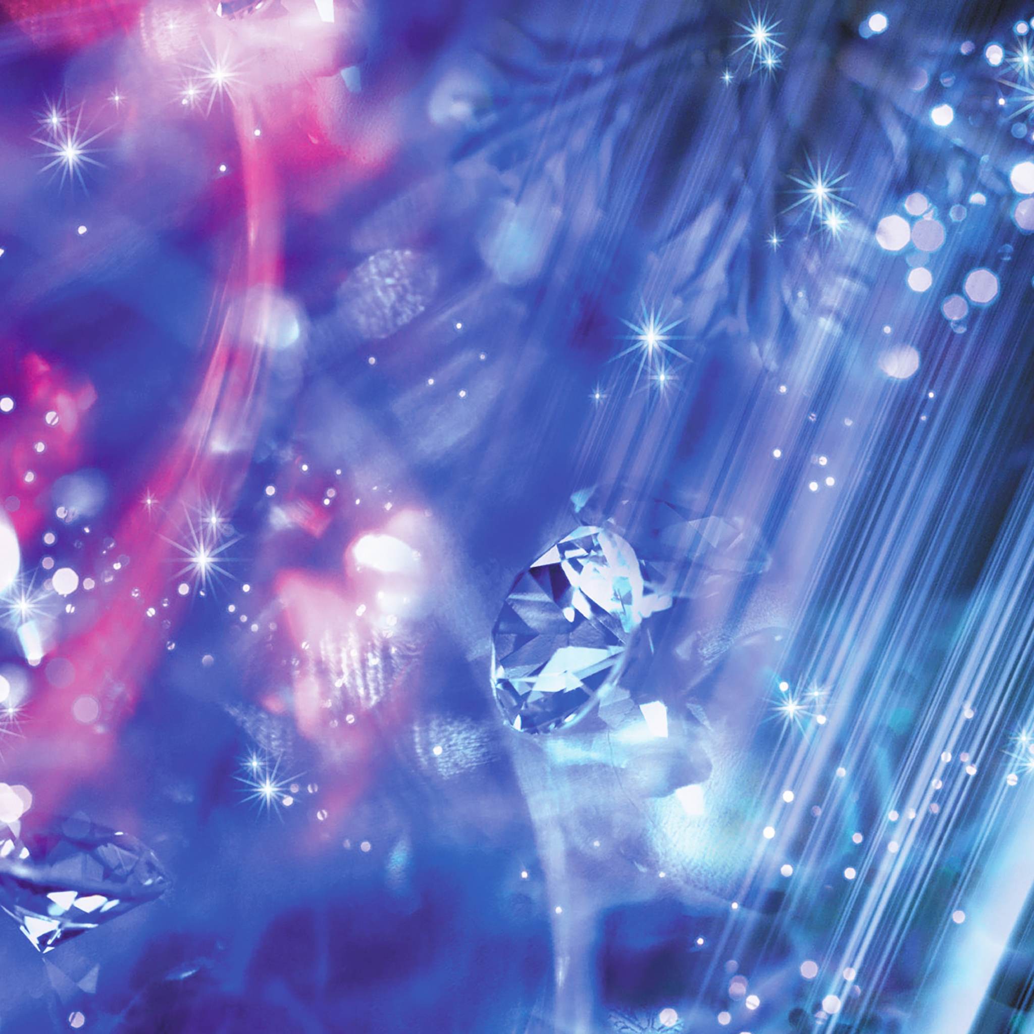 Close-up of diamonds and crystals with sparkling lights and colours.