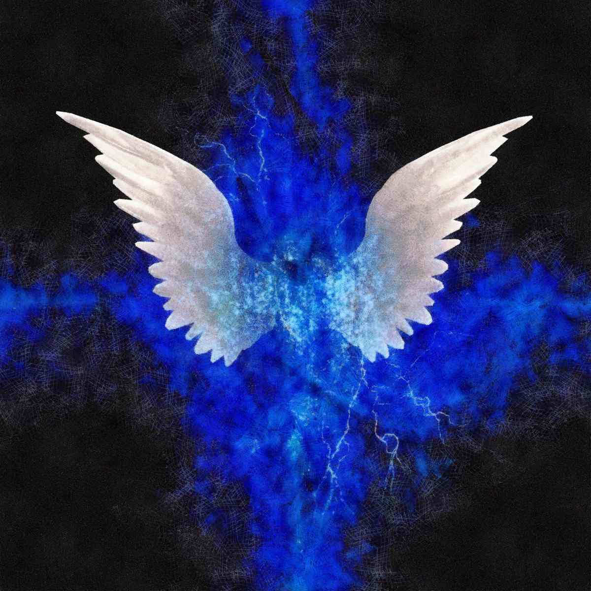 White angel wings with beautiful royal blue energies against a black background representing Archangel Michael.