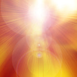 An intense yellow and orange light radiating outwards representing Archangel Jophiel illuminating energies.