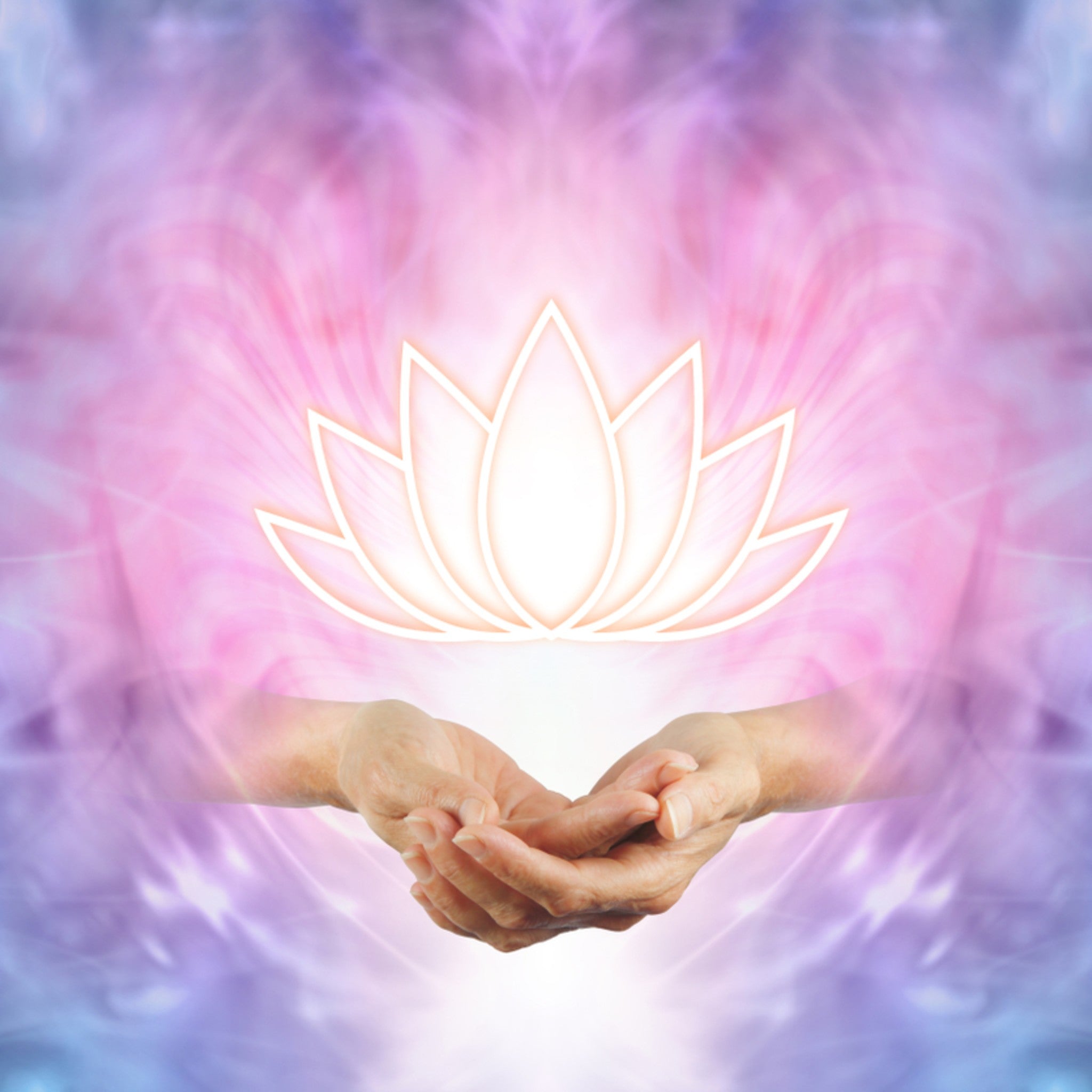 Spiritual gift: Hands holding a glowing lotus, symbolising healing and light for distant attunements and energy healing treatments.