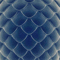 A close-up texture of deep blue dragon scales in a uniform, overlapping pattern, with subtle light highlights, representing dragon scales shielding.
