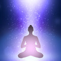 Silhouette of a person meditating with a radiant light effect on a blue background representing 741 solfege energy connections.