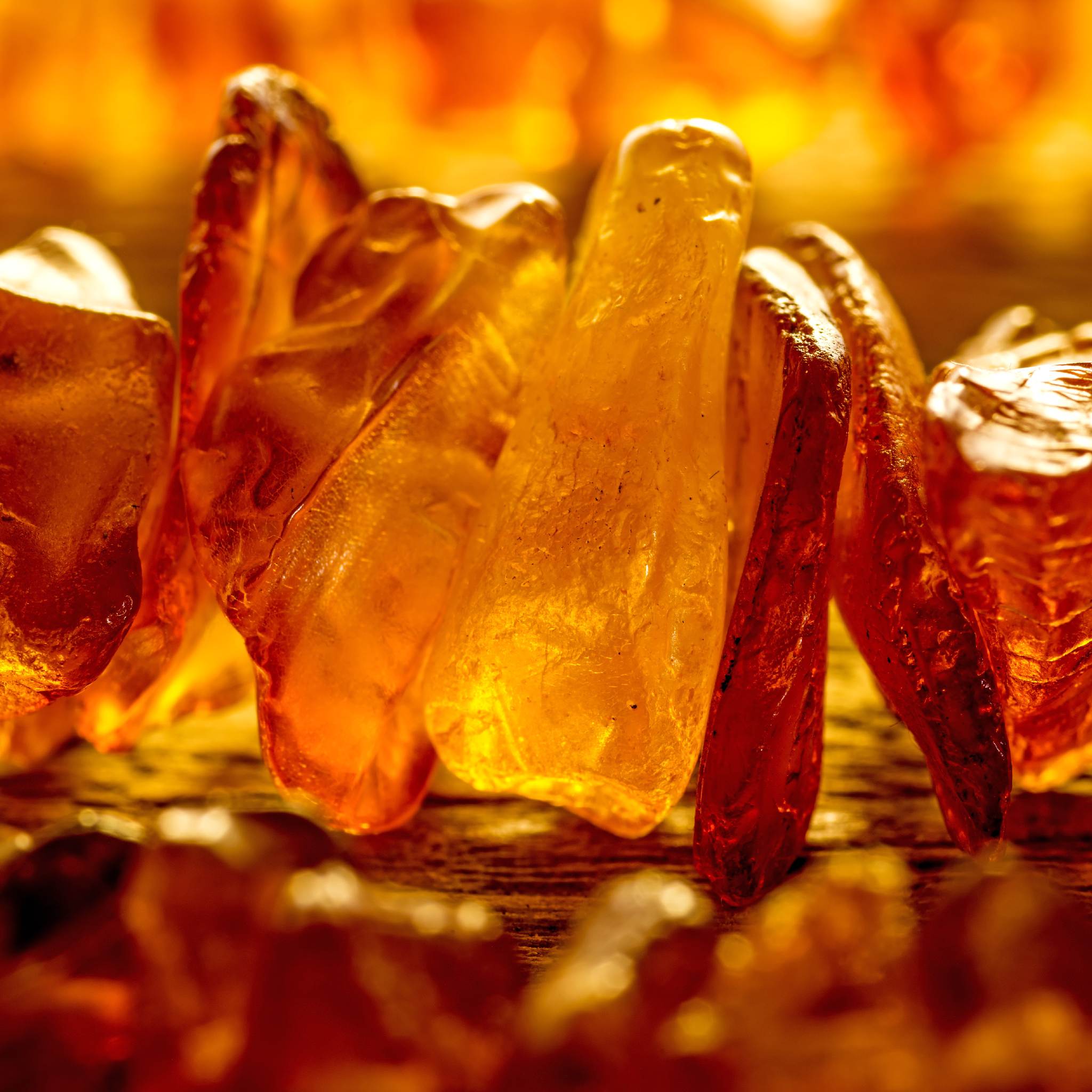 Glowing amber pieces, representing energetic amber connections.