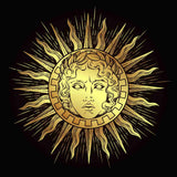 Gold sun with the god Apollo's face design on a black background.