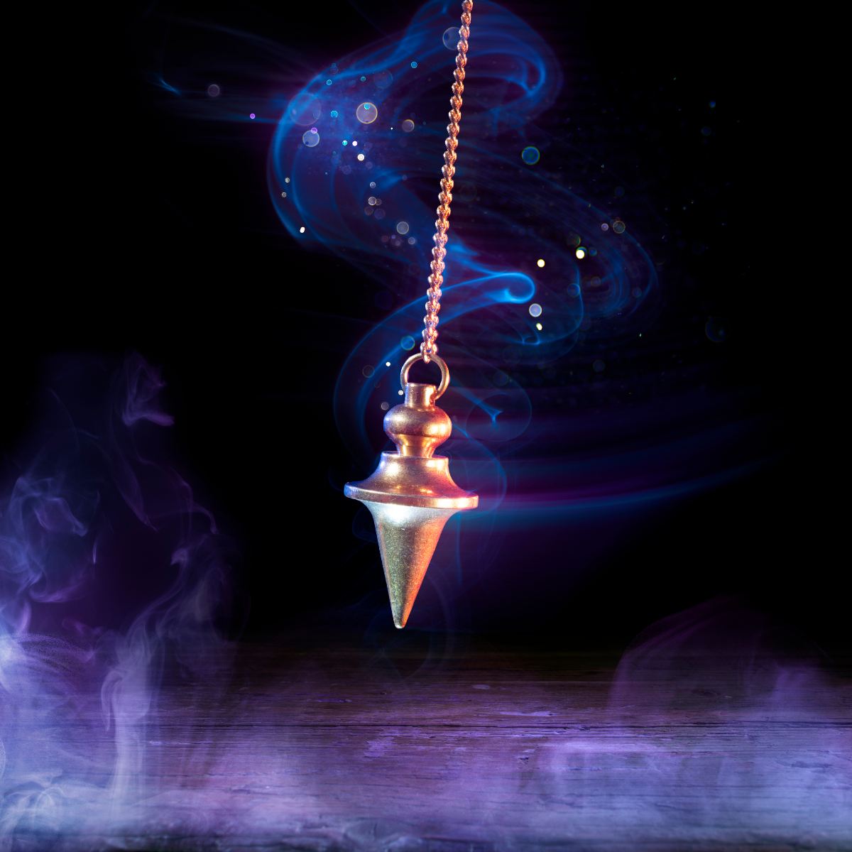 A brass pendulum, hanging from a chain, surrounded by wisps of ethereal blue and purple smoke and glowing particles.
