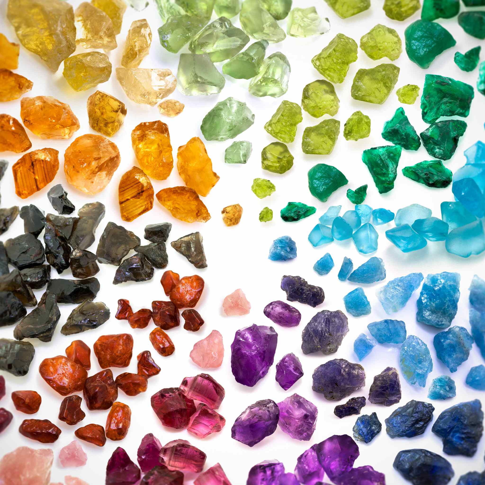 Dynamic Ethereal Crystal Connections Maintenance Attunement: raw crystals arranged in a rainbow colour spectrum.