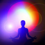 Silhouette of a meditating person with a colourful circular light effect representing dynamic healing frequencies.