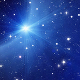 A bright white star bursting with light rays against a starry night sky, representing the energy of Orion connections.