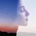 Woman's calm face with her eyes closed, layered over a sunset landscape with silhouetted birds flying.