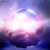 A pair of cupped hands holding a brilliant, glowing, iridescent sphere that resembles a crystal ball, radiating intense white and pink light. The background is dark with sparkling white dust or snow falling.