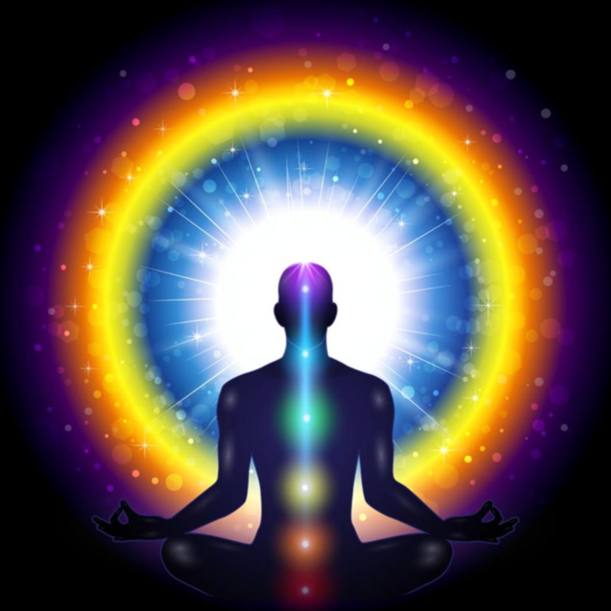 Silhouette of an enlightened person in meditation with a rainbow energy circle and chakra colours on a dark background.
