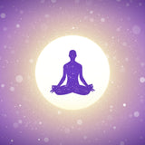 Silhouette of a person in meditation pose on a bright circle with a purple gradient background.