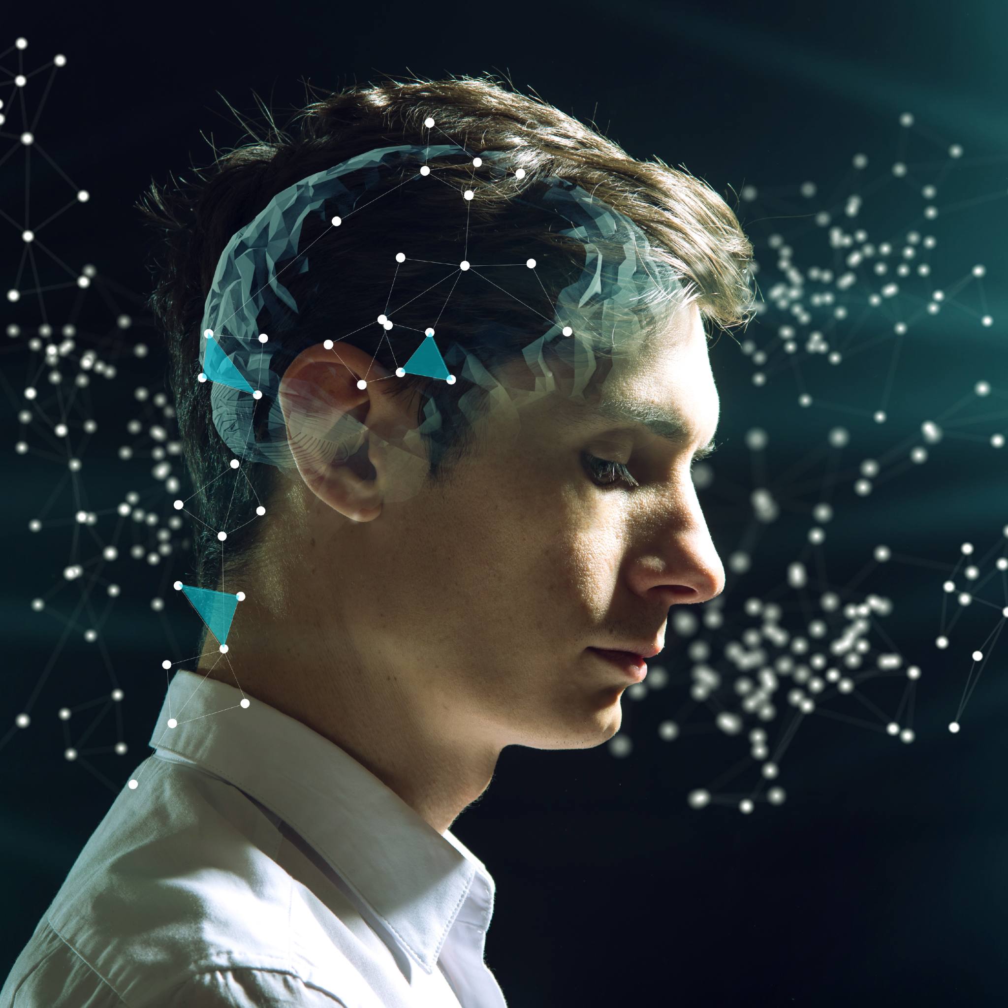A close-up profile view of a person wearing a white shirt against a dark background, with a translucent, geometric representation of a brain overlaid on their head. White dots and blue triangular nodes float around the head and background, suggesting neural and subconscious connections.