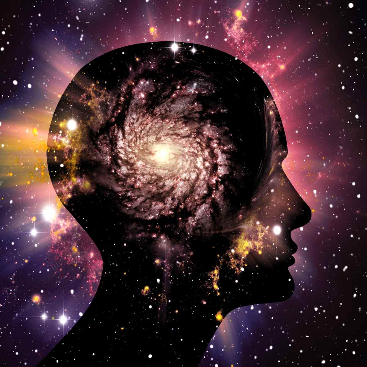 Silhouette of a head and Third Eye Chakra with a galaxy inside against a cosmic background.