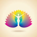 Silhouette of a person with outstretched arms with rainbow-coloured abstract lotus petals. 