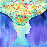 A watercolour profile silhouette with brightly coloured flowers emerging from the head, against a blue background.