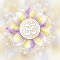 White gold Causal Chakra with a white symbol on a light cream background.