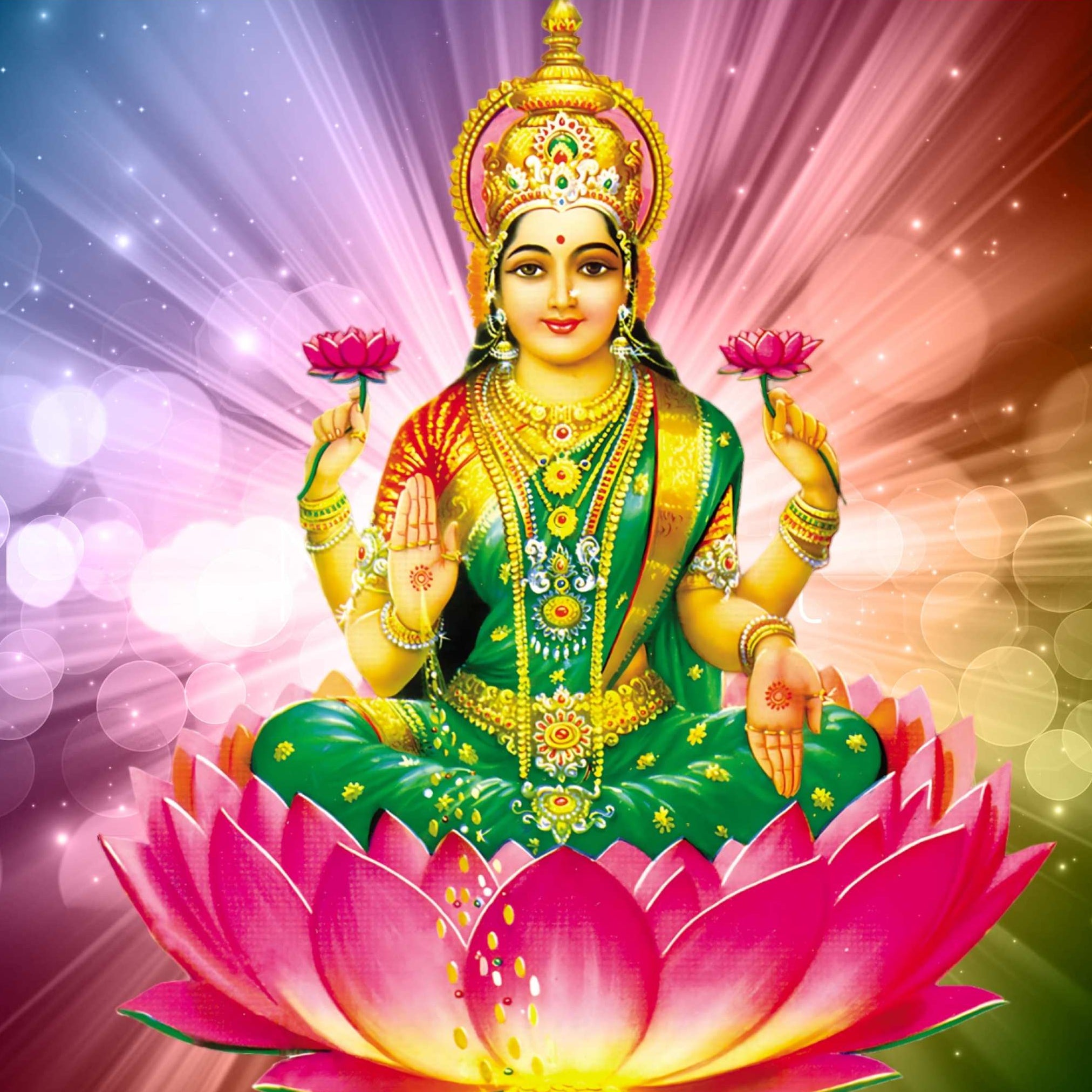 The Hindu Goddess Lakshmi seated on a lotus, signifying causal chakra activation.