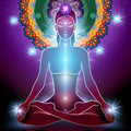 Silhouette of a meditating person with a colourful mandala and glowing lights on a purple background.