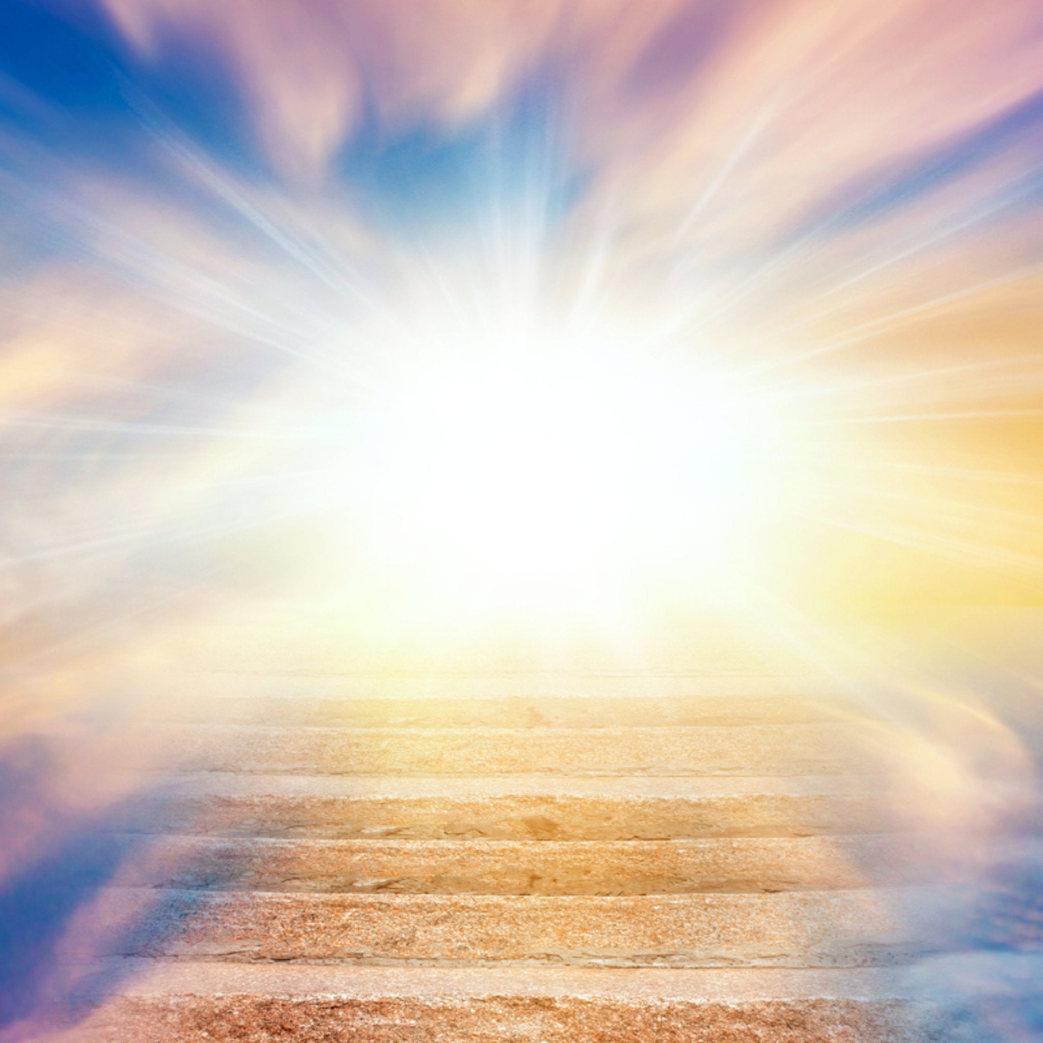 A stone staircase ascending into a radiant light, symbolising a spiritual journey to embrace one's calling.