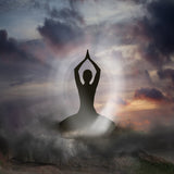 Silhouette of a person in a yoga pose against a dramatic sky with clouds and sun surrounded by protective white light.