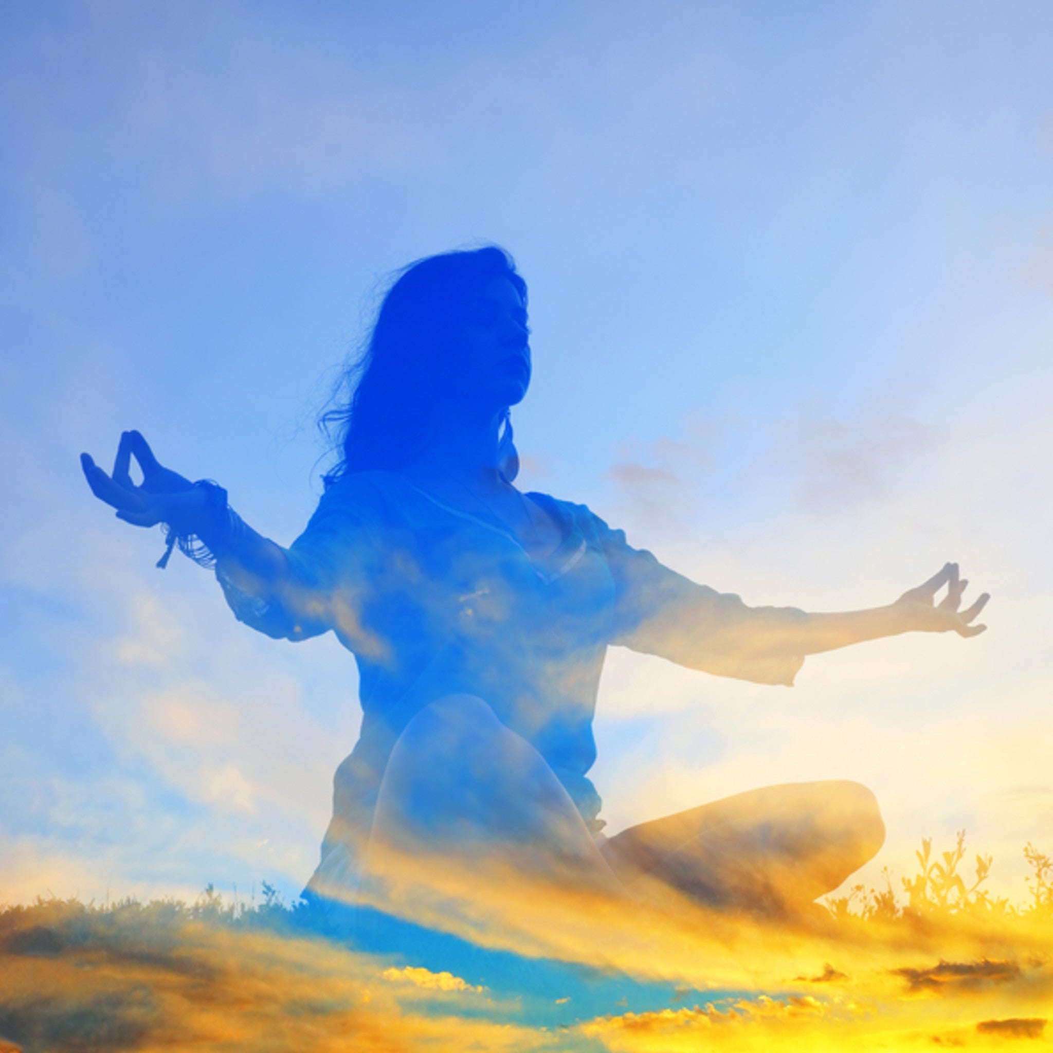 A silhouette of a person in a meditative pose against a vibrant sunrise sky. The figure is translucent, blending with the clouds.
