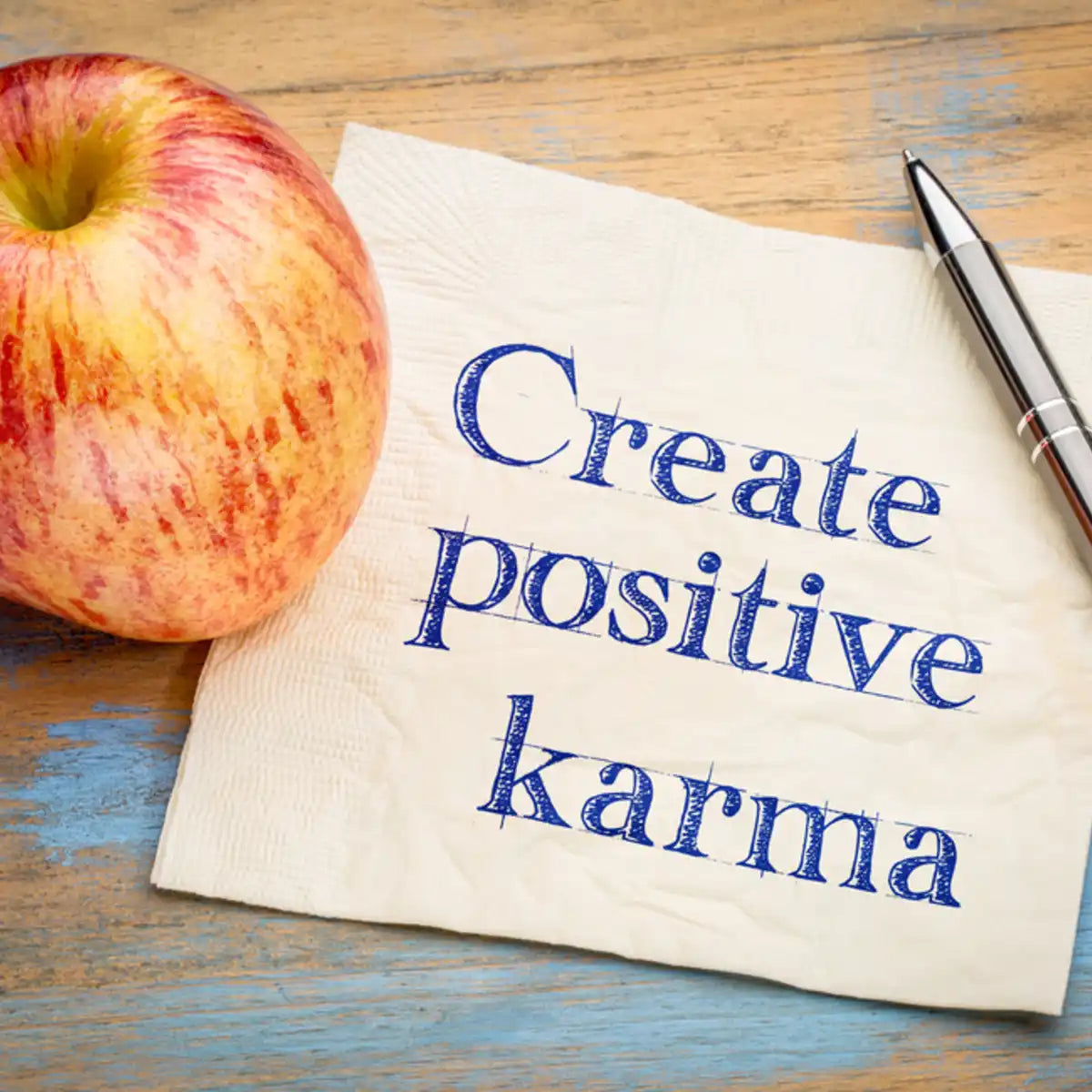 Ultimate Karma Clearing Treatment: apple and positive karma text.