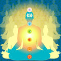 Illustration of a person meditating surrounded by fainter glowing silhouettes representing past lives.