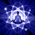 Silhouette of a person in meditation with a radiant, energy-like design on a blue background.